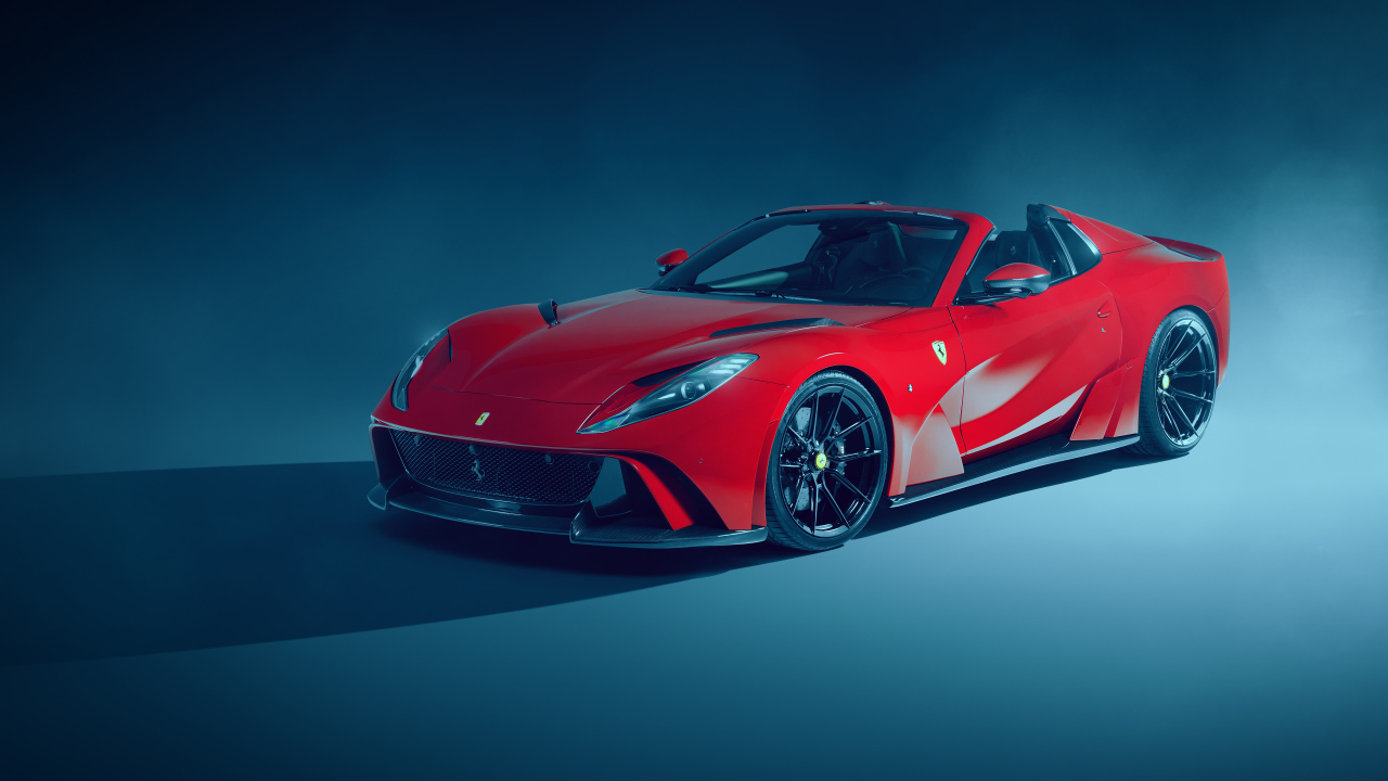 Красный кабриолет Novitec Ferrari 812 GTS N-Largo 2021 года на сером фоне