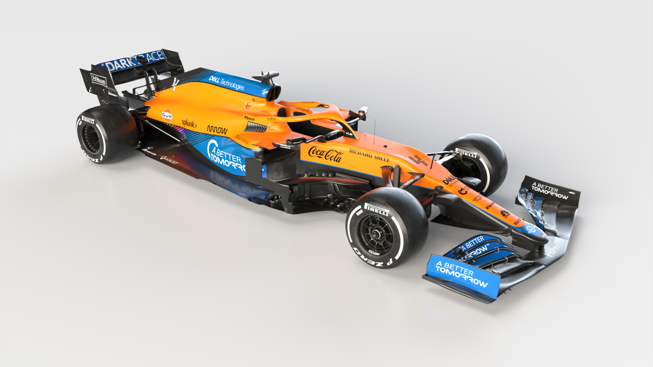 Быстрый гоночный автомобиль McLaren MCL35M 2021 года на сером фоне