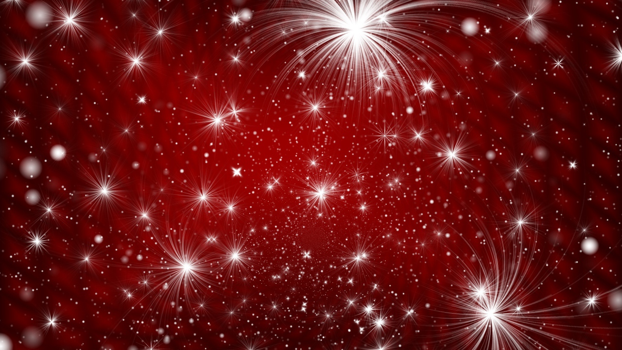 Яркие белые искры на красном фоне 