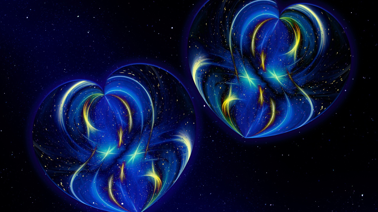 Два красивых неоновых сердца на синем фоне