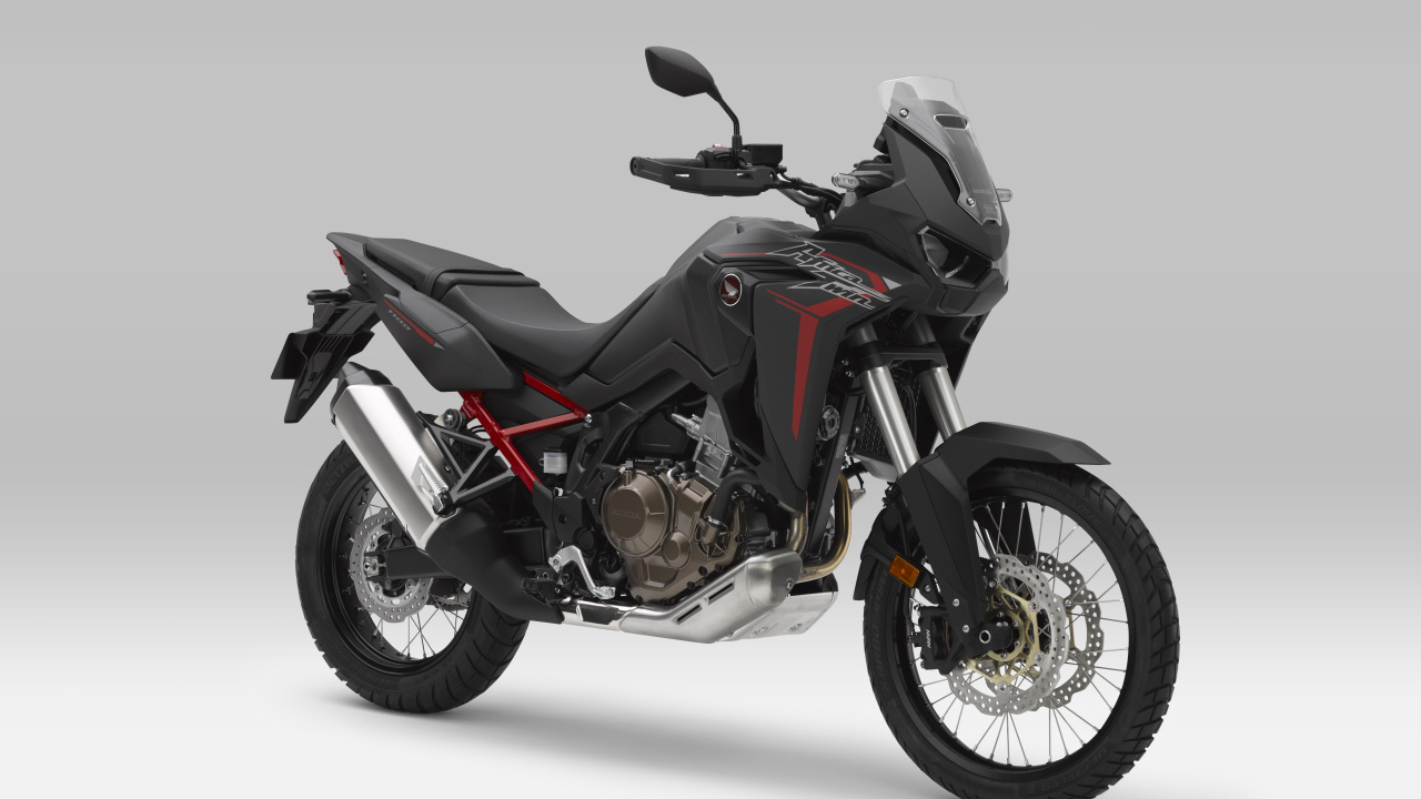 2021 Honda CRF1100L Africa Twin Black Motorcycle Against Gray Background
