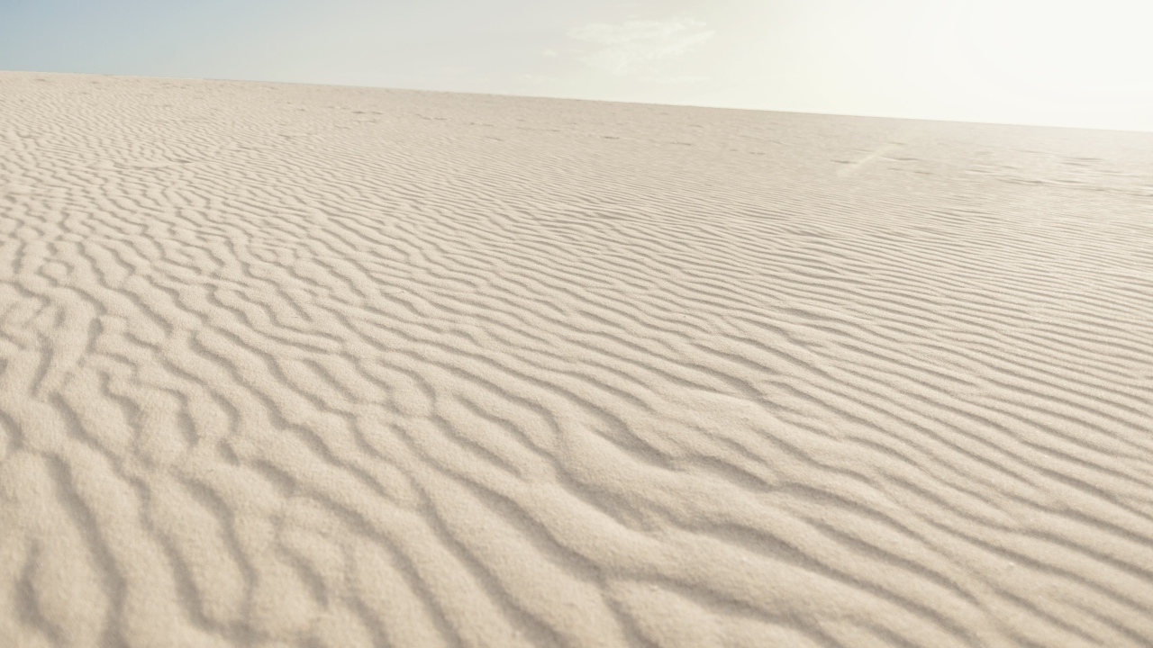 Красивый волнистый белый песок в пустыне