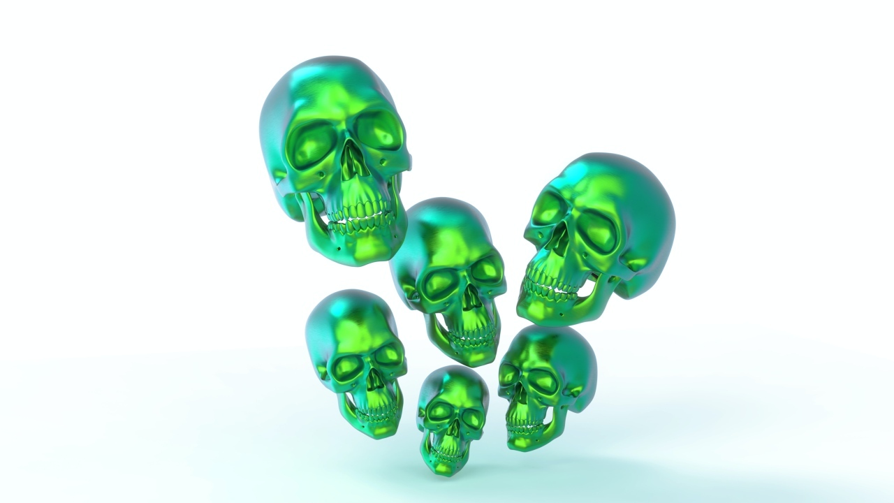 Зеленые стальные черепа на белом фоне