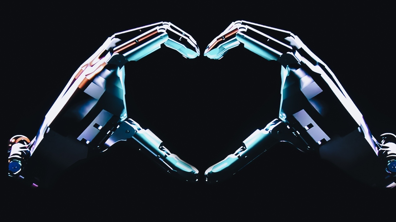 Робот делает сердце руками