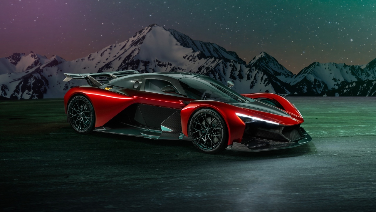 Красный спорткар Zenvo Aurora Agil  на фоне гор