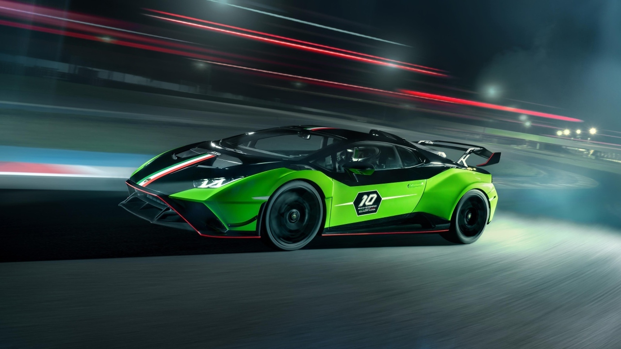 Зеленый быстрый автомобиль Lamborghini Huracan STO SC 10 Anniversario