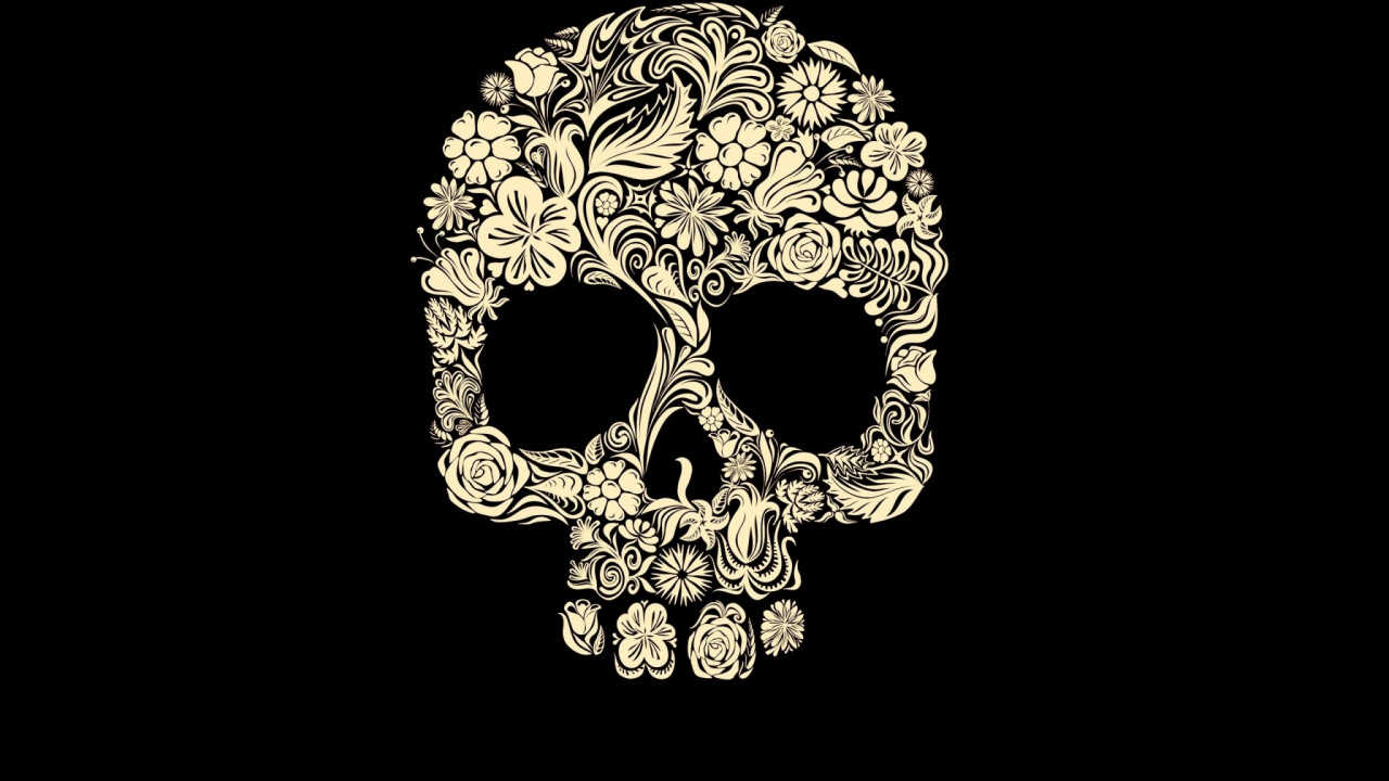 Череп из цветов на черном фоне