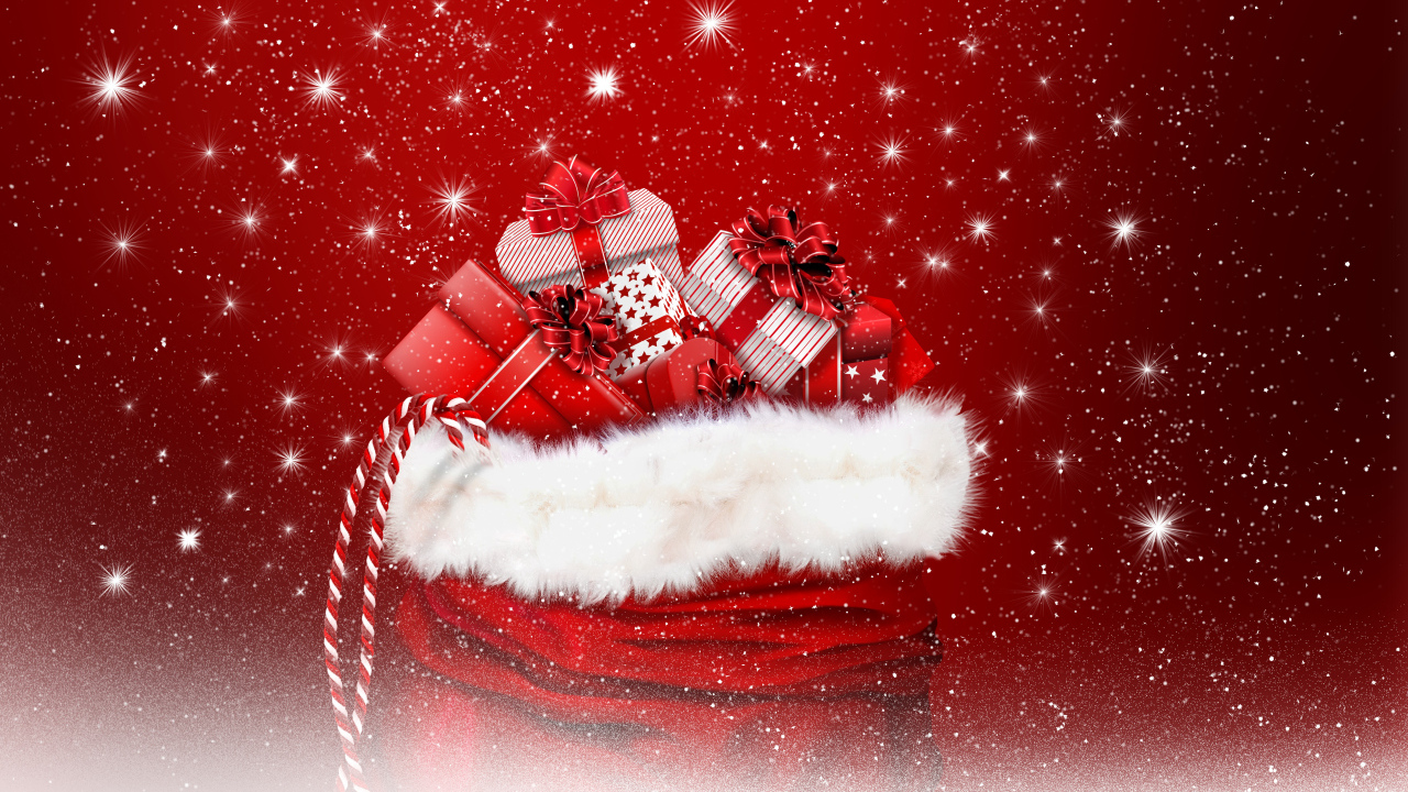 Мешок с подарками на Рождество на красном фоне