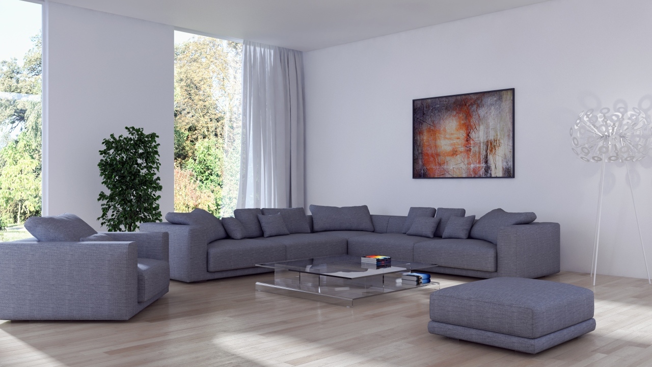 Большой серый диван в гостиной комнате