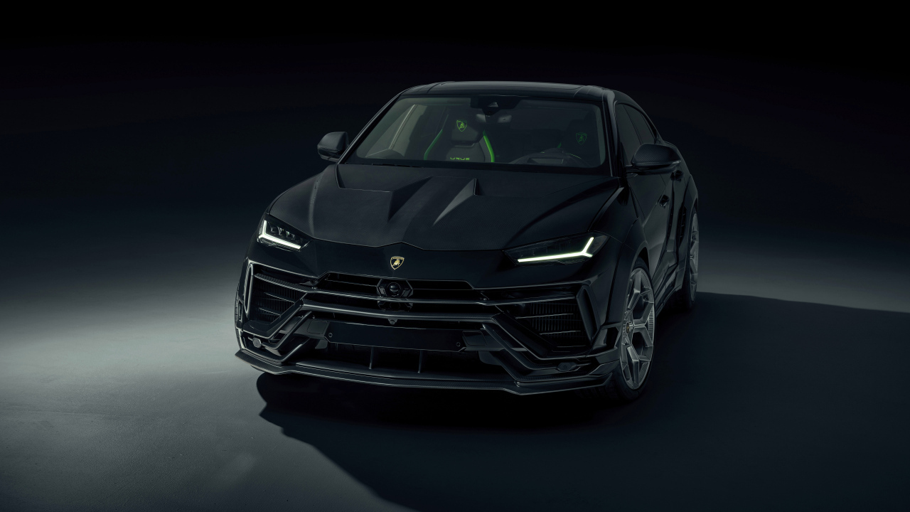 Автомобиль Lamborghini Urus на черном фоне