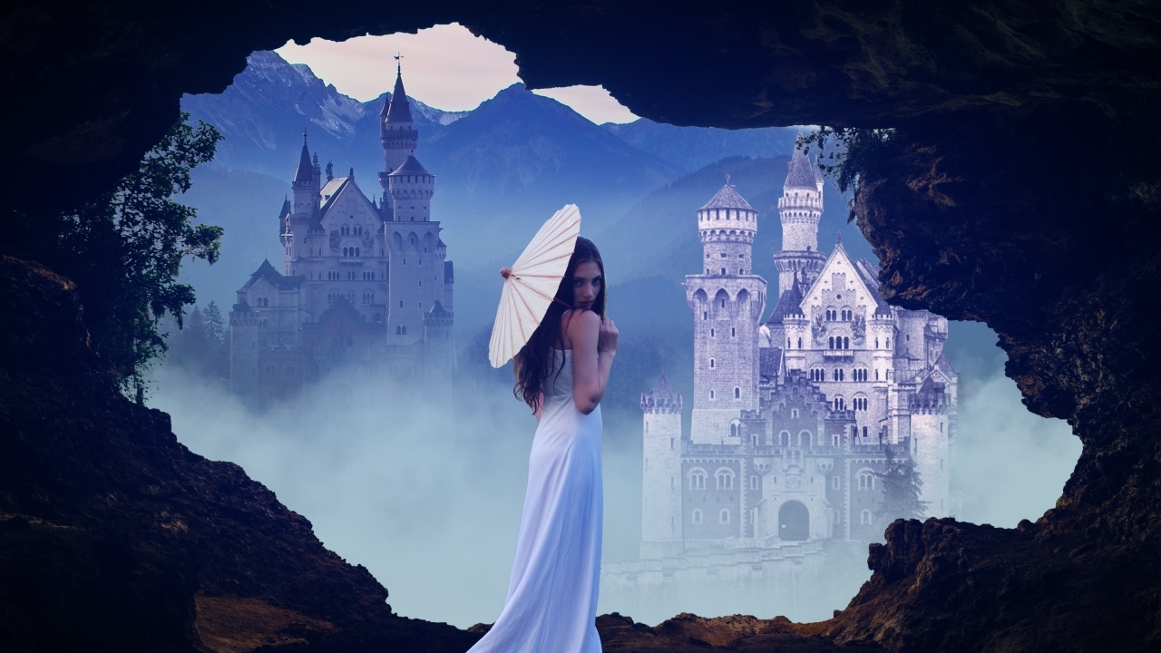 Девушка в белом платье с зонтом на фоне замка