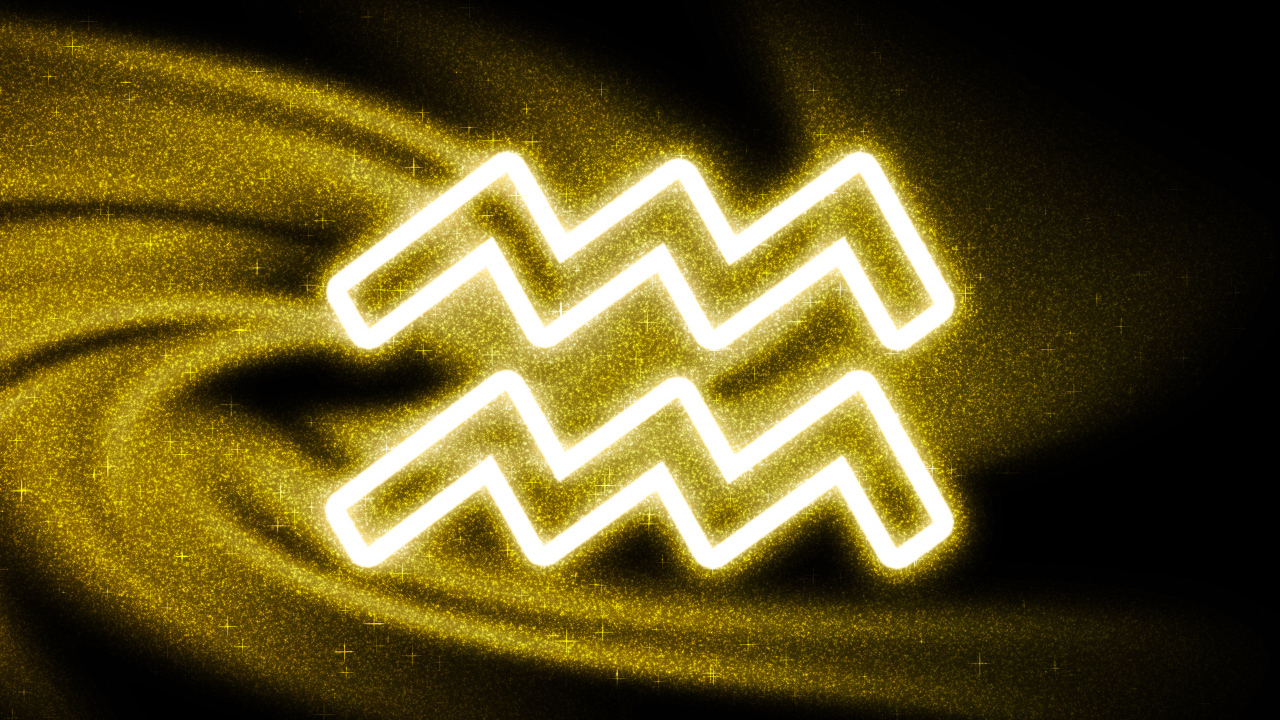 Золотистая пыль со знаком зодиака водолей на черном фоне