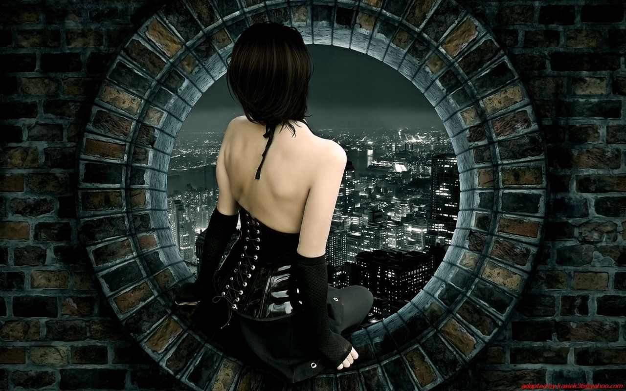 Девушка смотрит на город