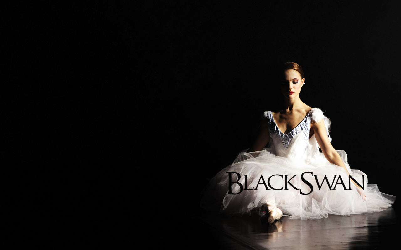 Балерина в образе белого лебедя