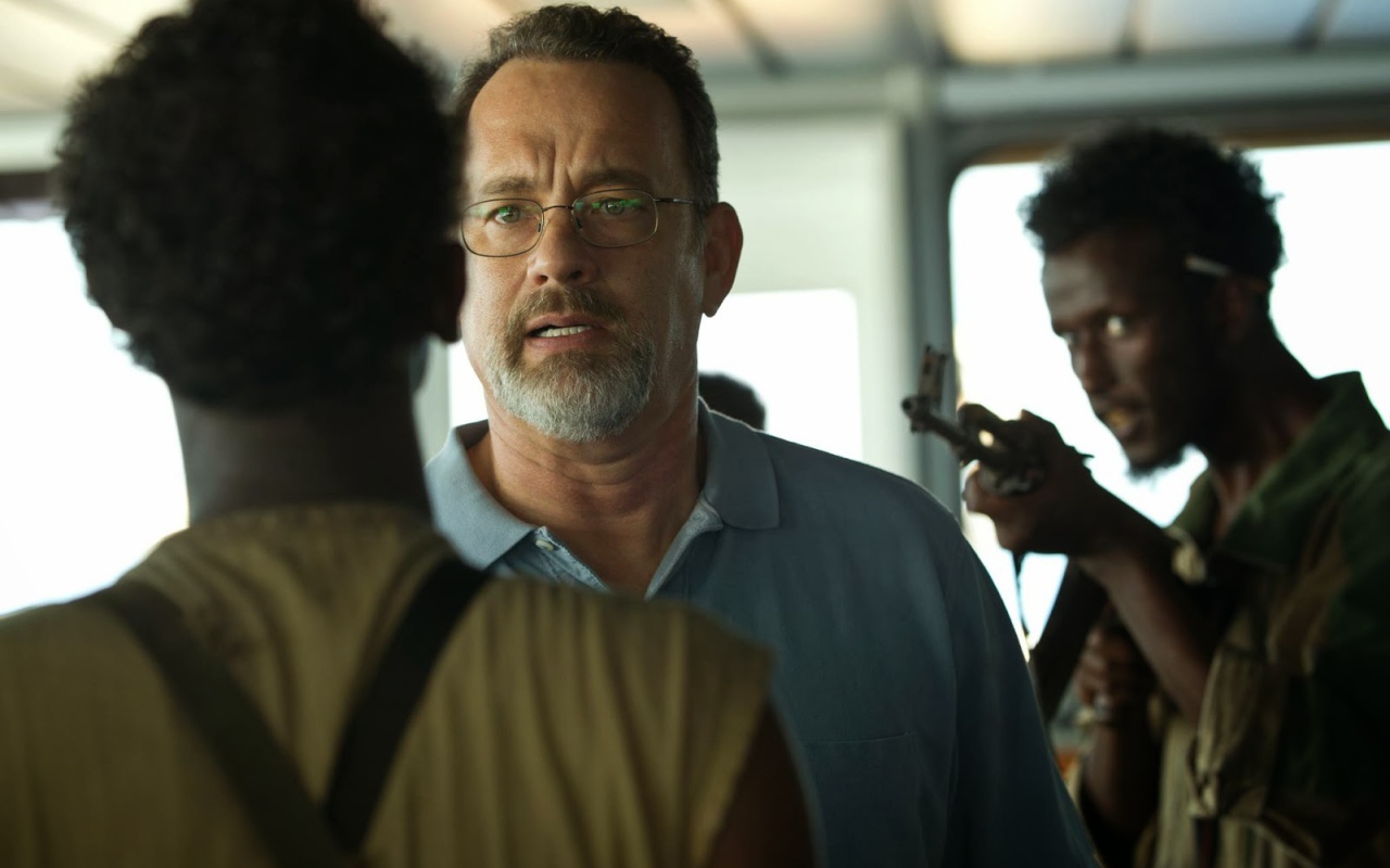 Капитан Филлипс главны герой говорит с пиратами