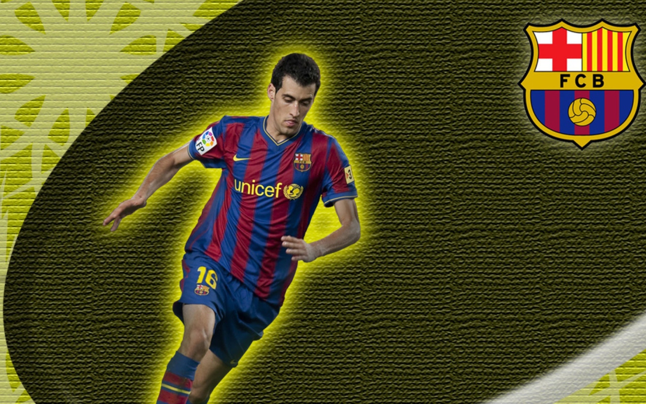 The football player of Barcelona Sergio Busquets on yellow background