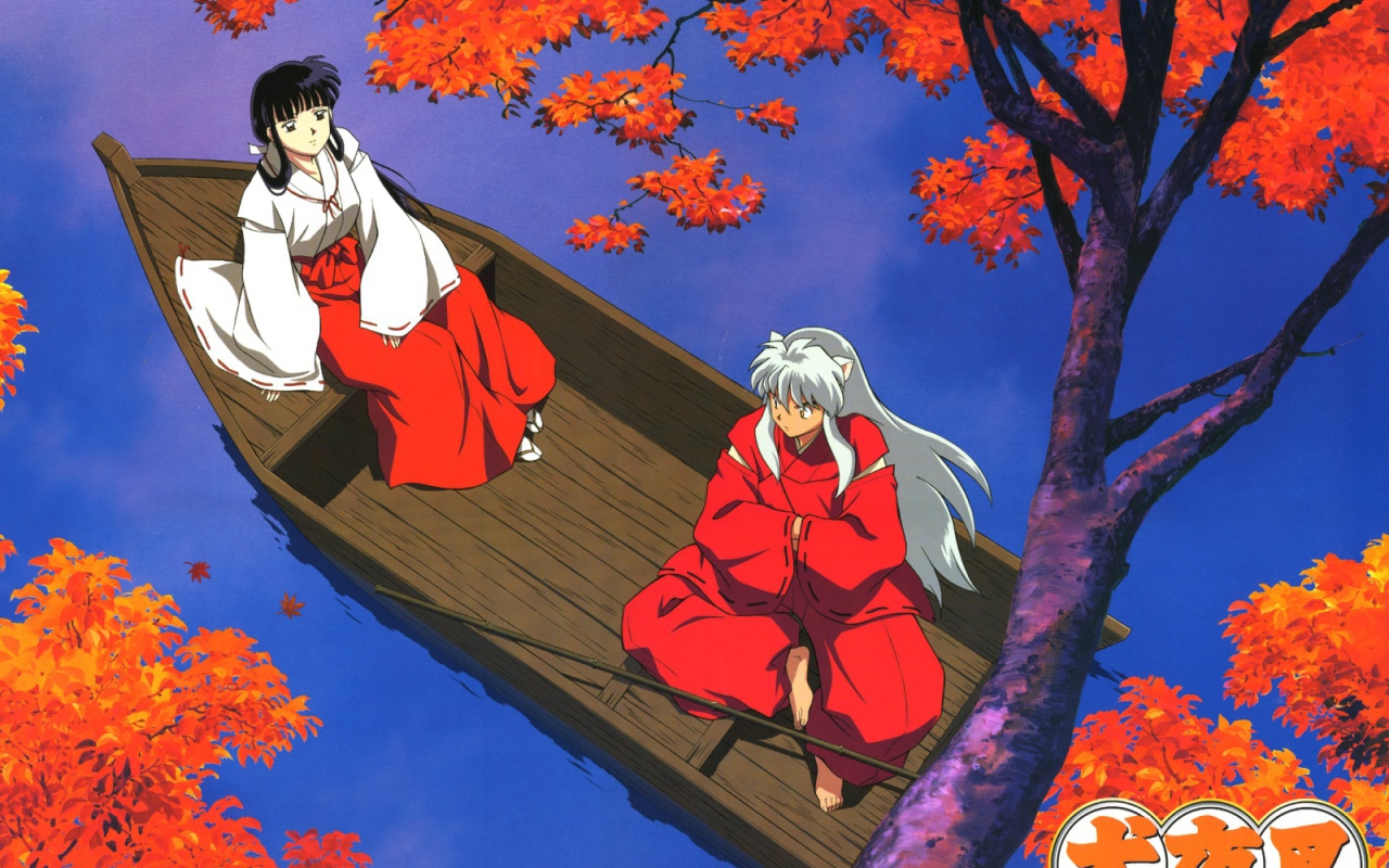 Две девочки в лодке осенью