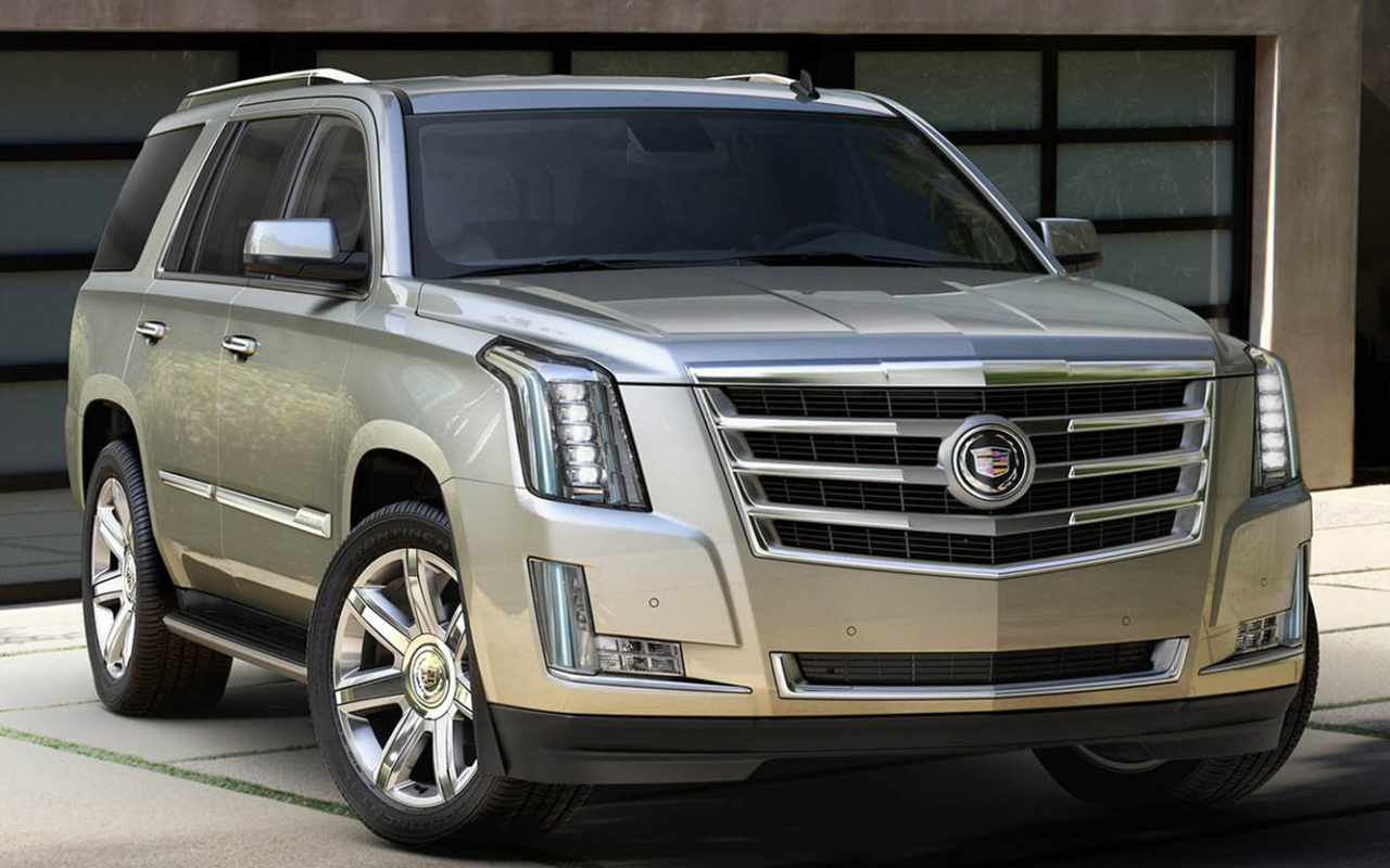 Золотистый Cadillac Escalade 2014
