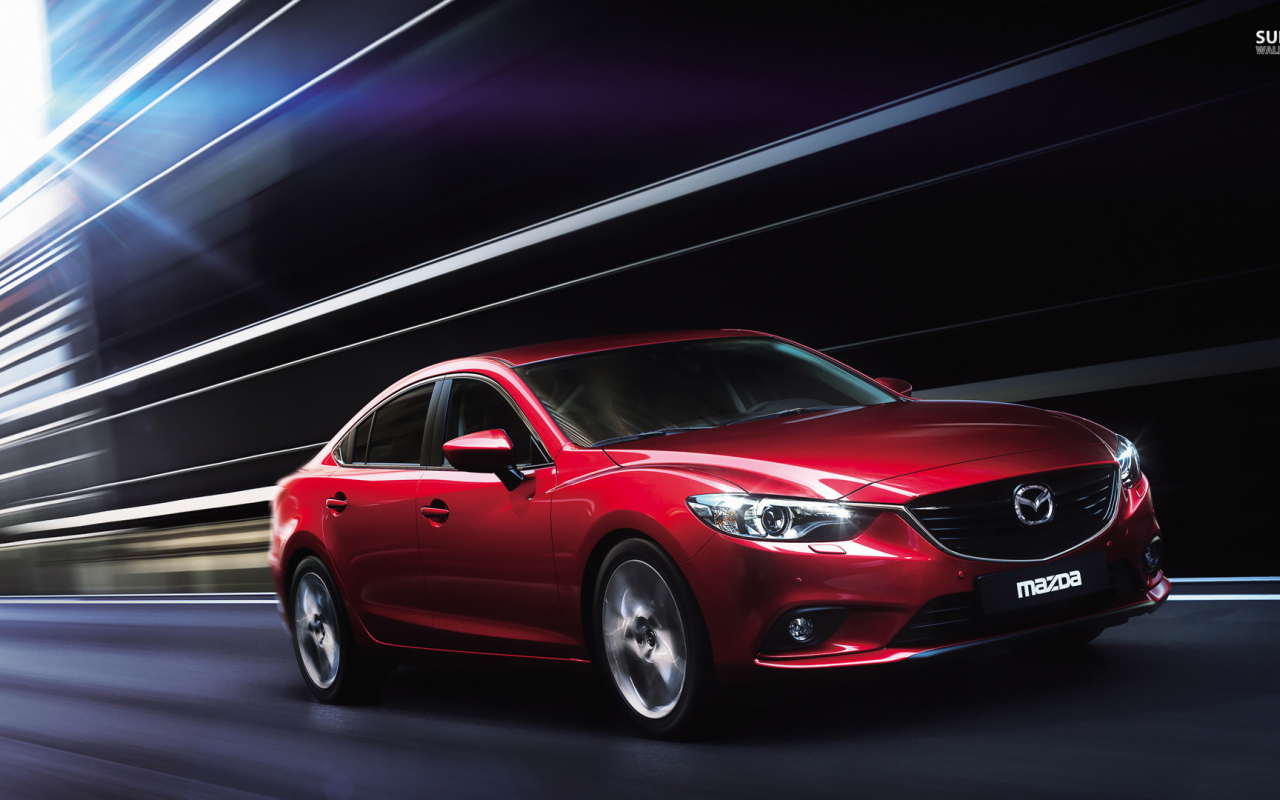 Надежная машина Mazda 3 2014