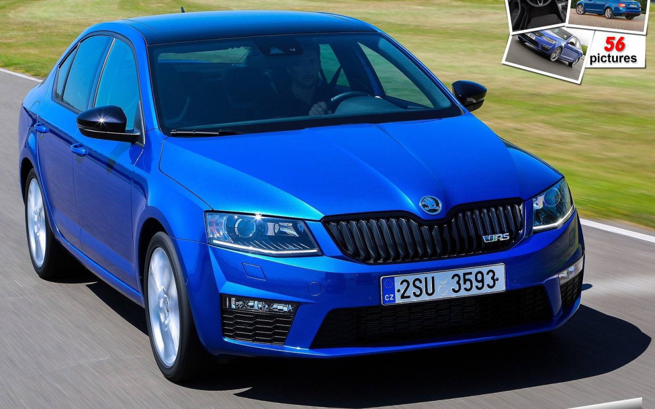 Автомобиль Skoda Octavia 2014 на дороге 