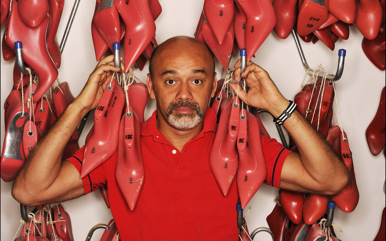 Известный модельер Christian Louboutin
