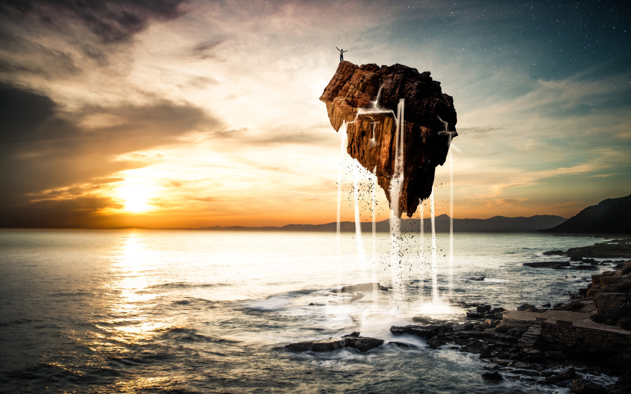Человек стоит на скале