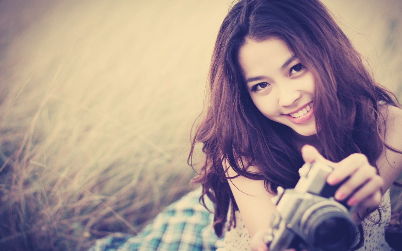 Девушка с фотоаппаратом