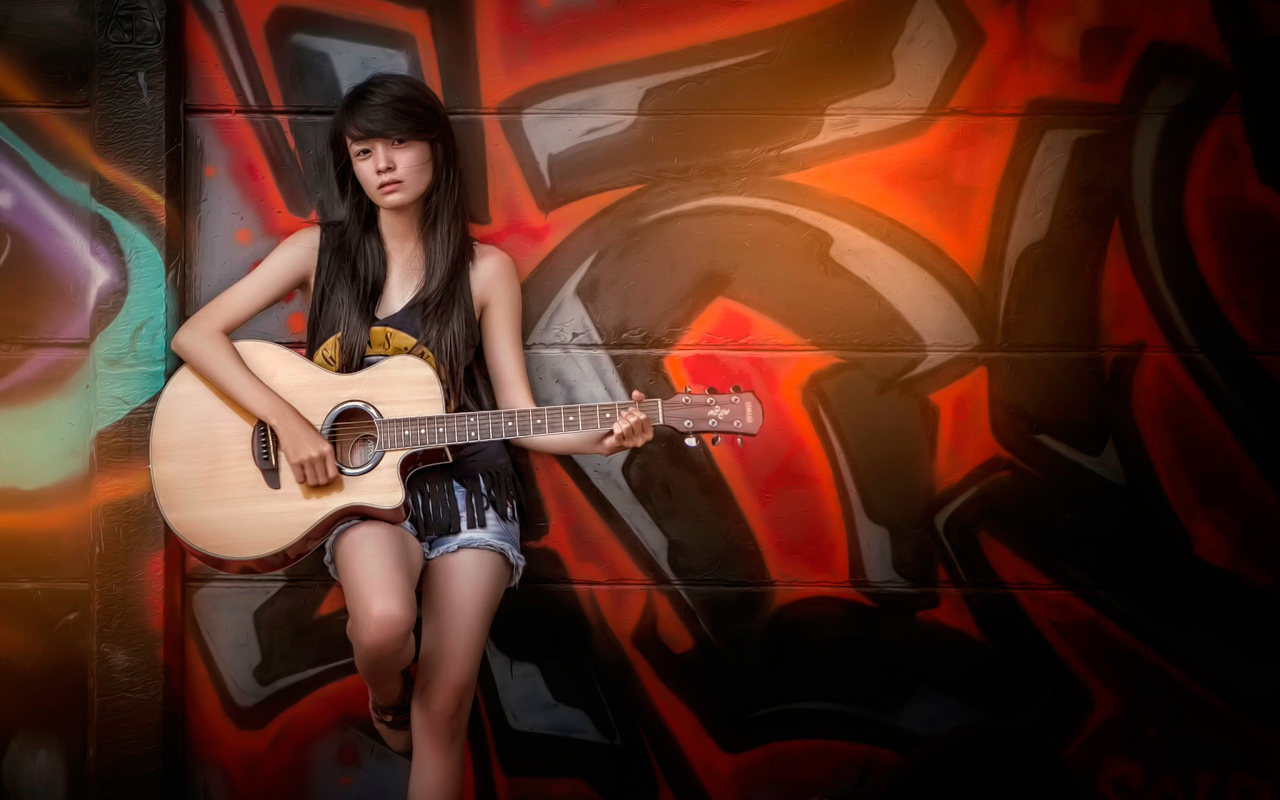 Японка с гитарой