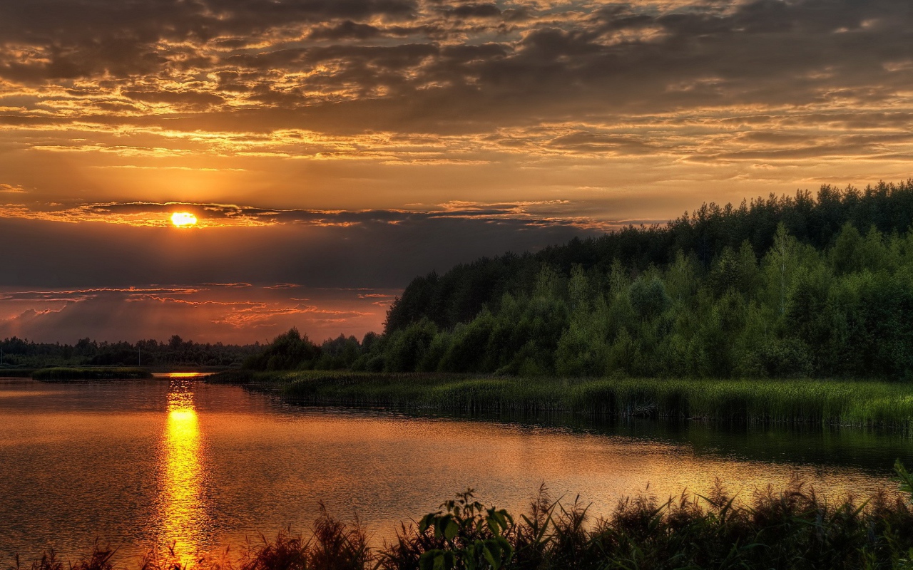 Закат солнца за тучу