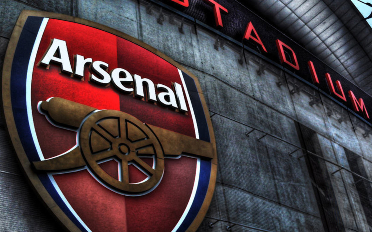 Арсенал логотип на стене