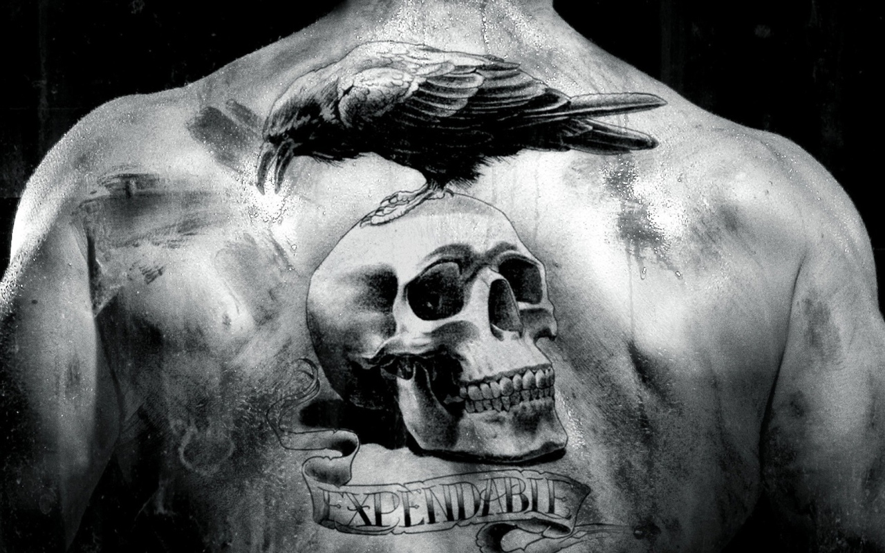 Тату череп на спине