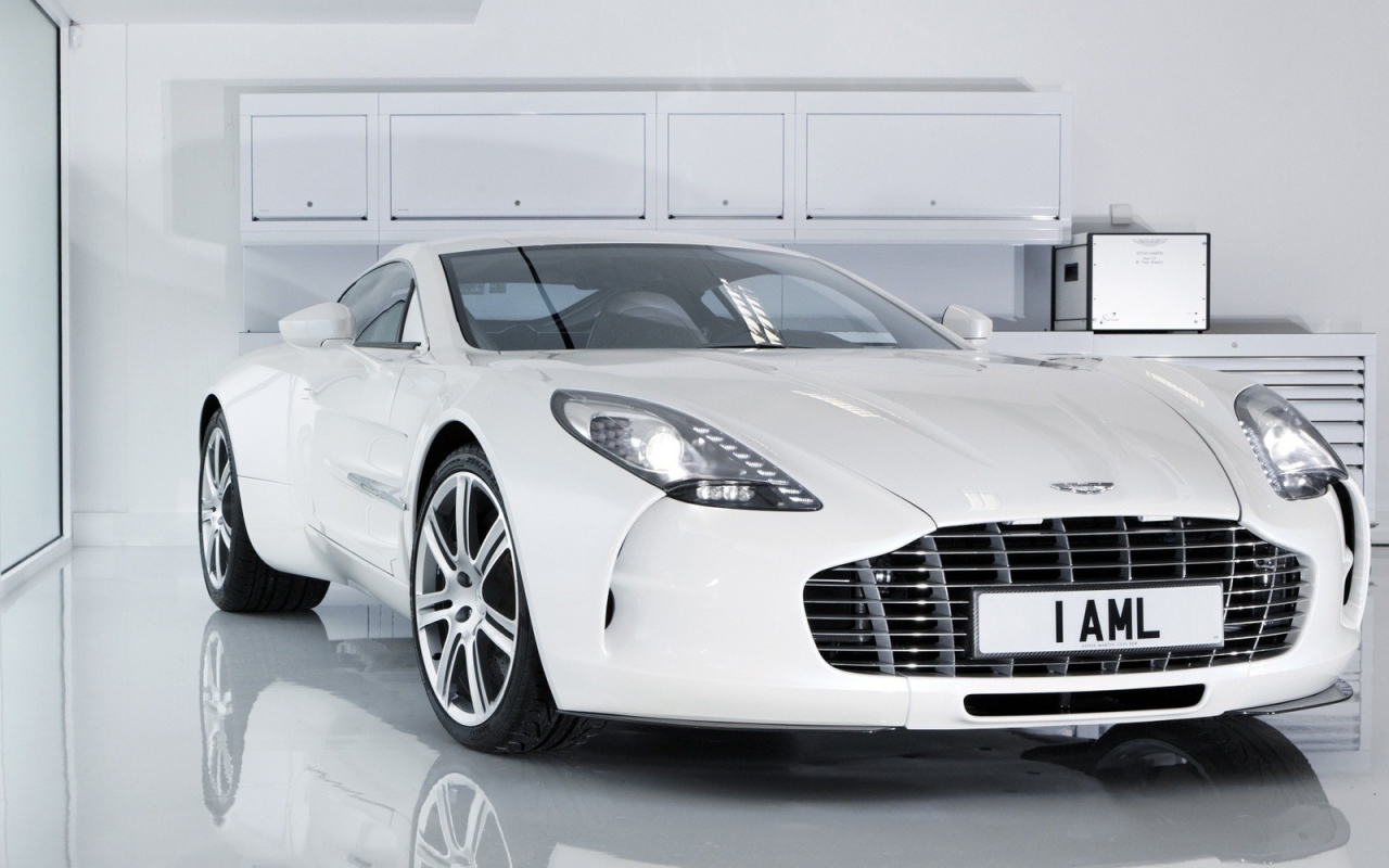 White Aston Martin in a white garage