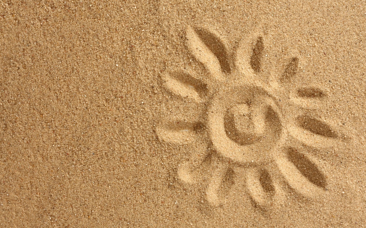 Рисунок солнца на песке