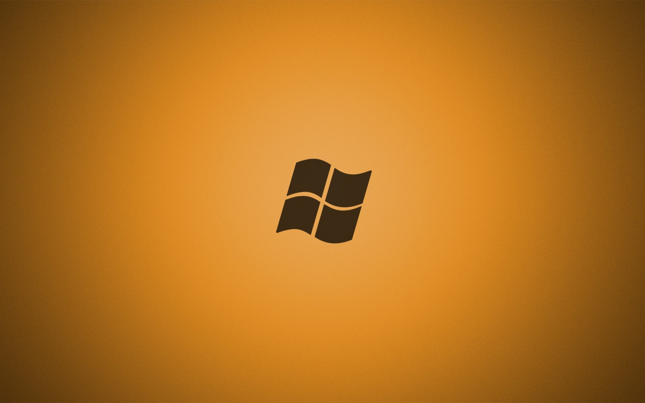 Серый логотип Майкрософт, оранжевый фон