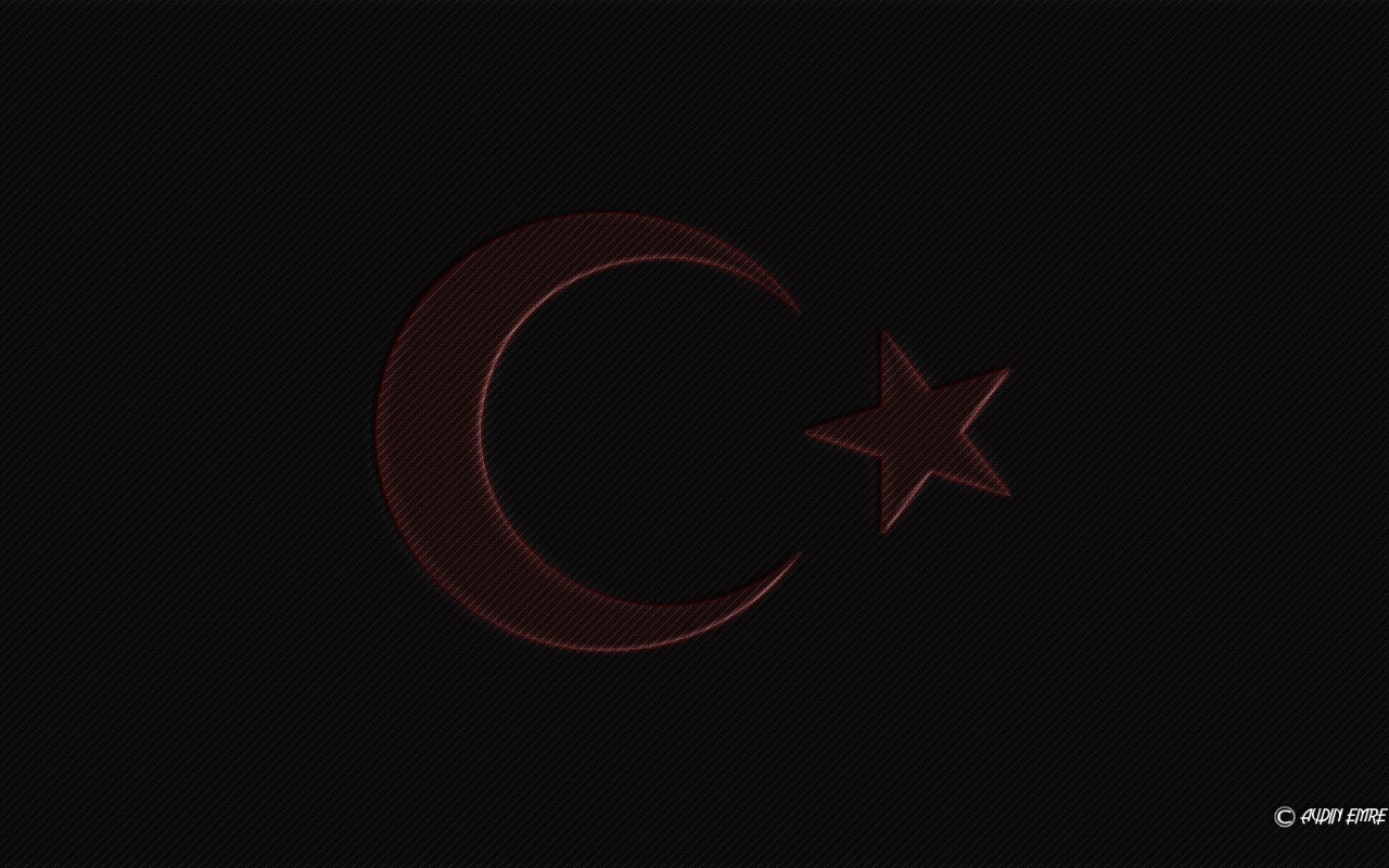 Красная луна и звезда на черном фоне