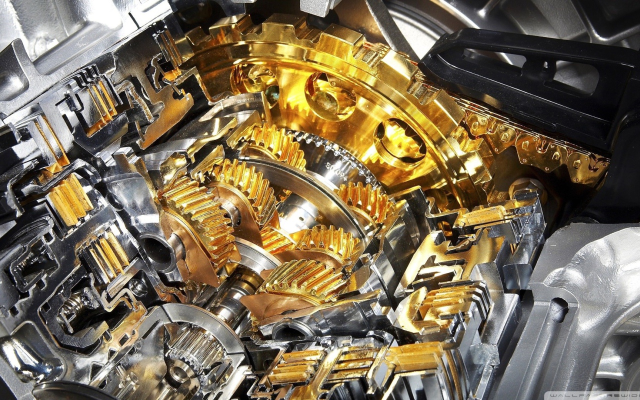 Позолоченные шестеренки в двигателе