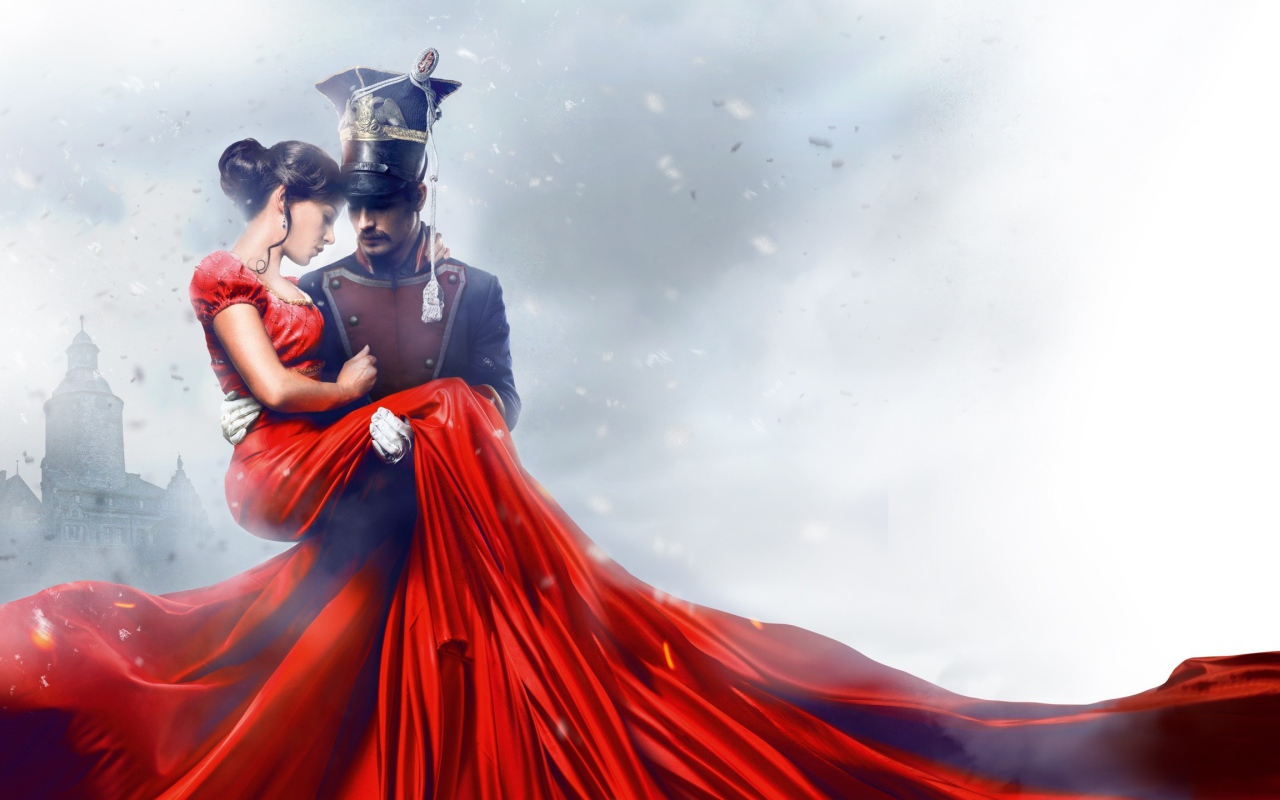 Улан держит на руках девушку в красном платье