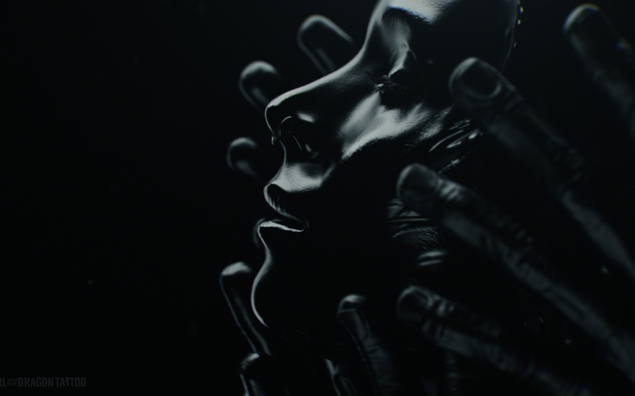 Лицо девушки в черных ладонях