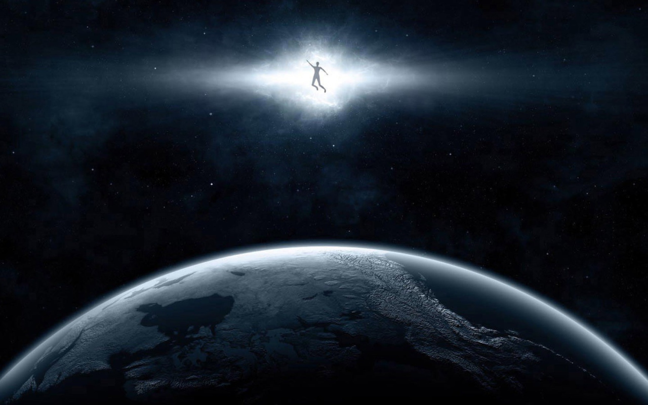 Человек в луче над планетой
