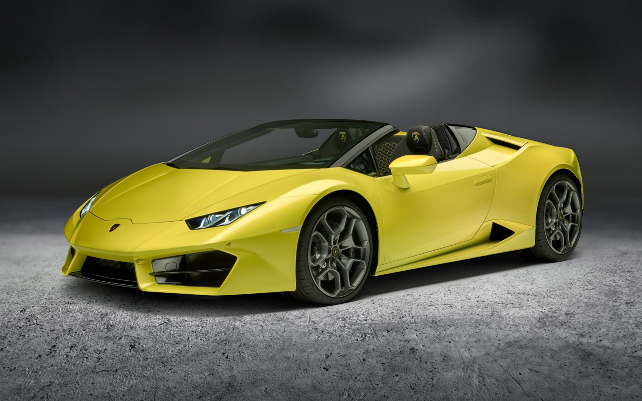 Желтый автомобиль кабриолет Lamborghini Huracan