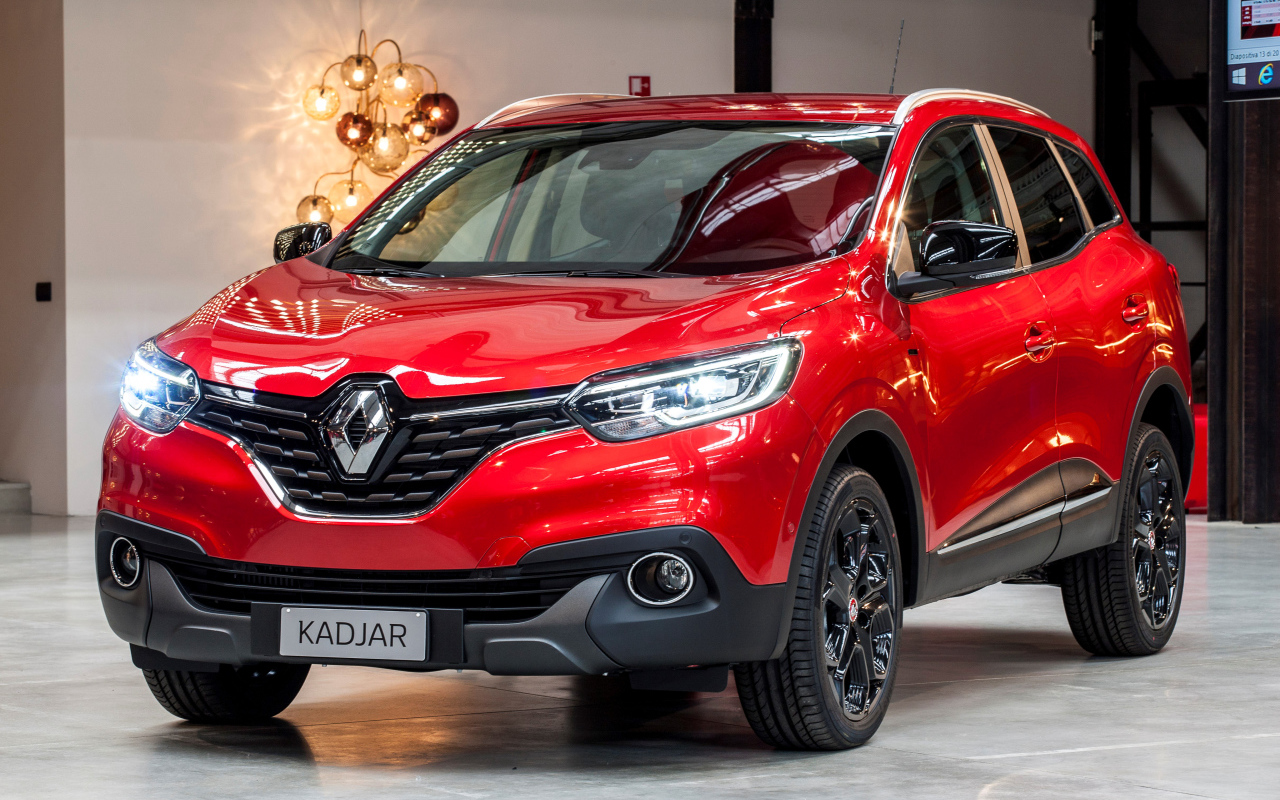 Красный автомобиль кроссовер Renault  Kadjar 