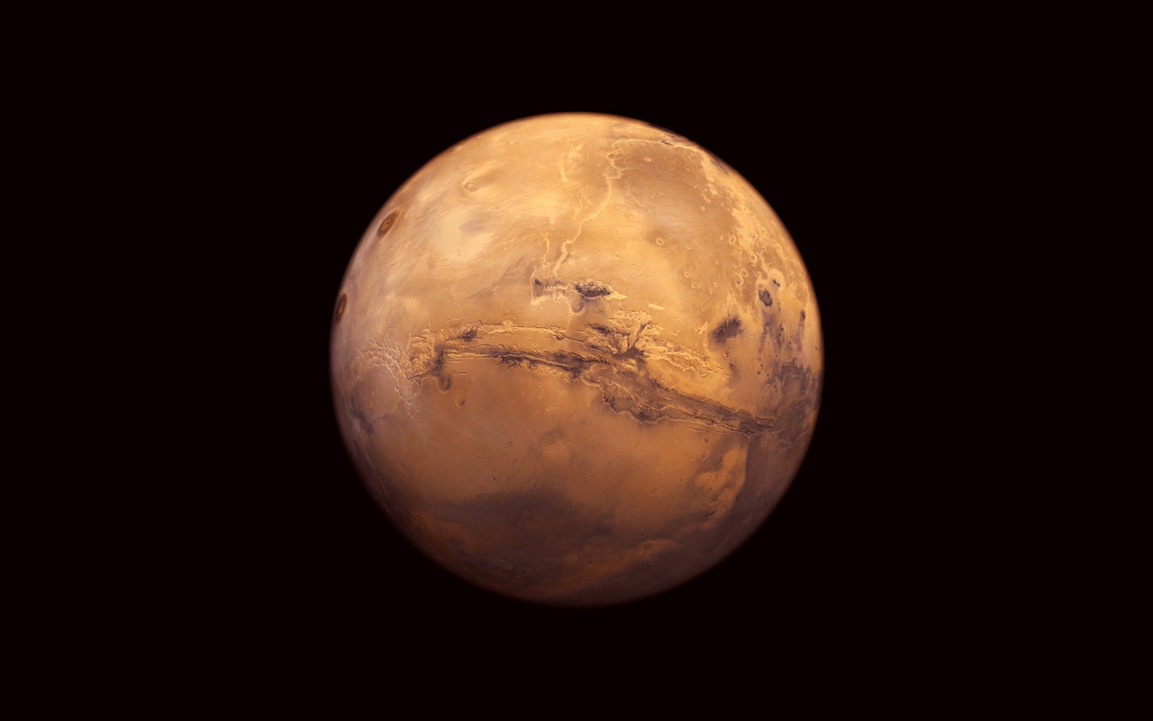 Планета Марс на черном фоне  