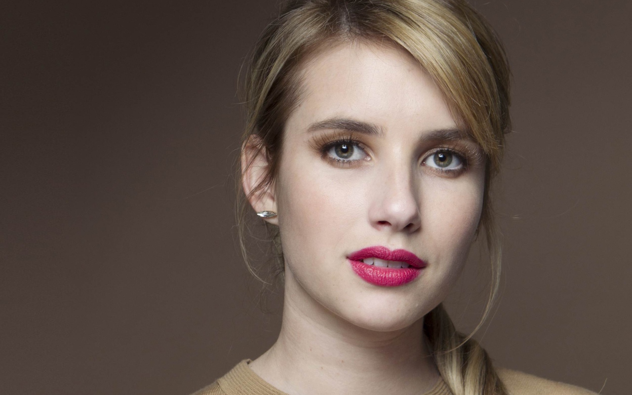 Young actress Emma Roberts with pink lips