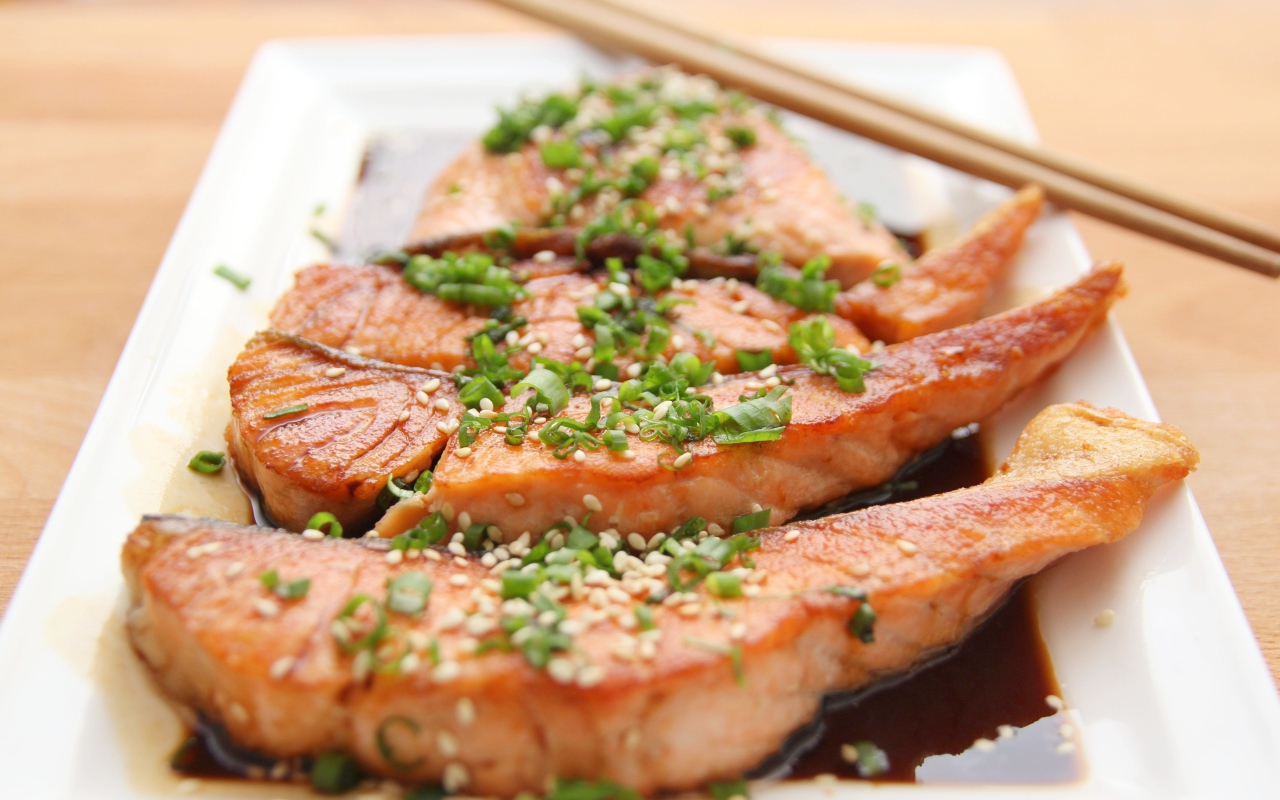 Red fish with sesame, green onions and soy sauce
