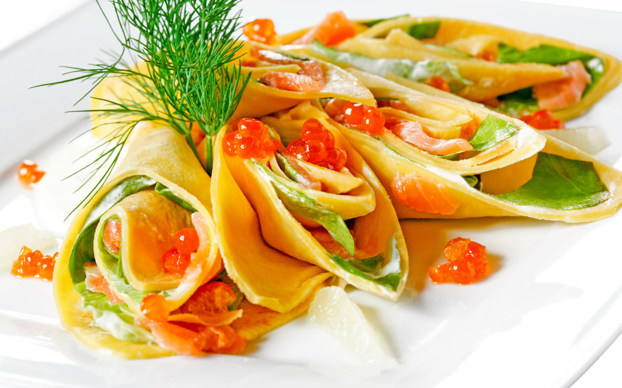 Рулетики из блинов с красной рыбой и красной икрой и зеленью на Масленицу