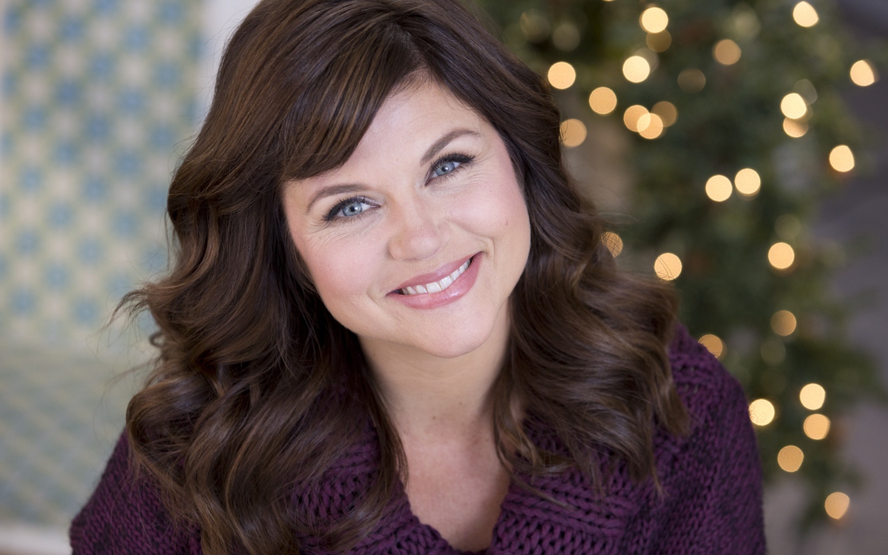 Милая голубоглазая улыбающаяся актриса Тиффани Тиссен