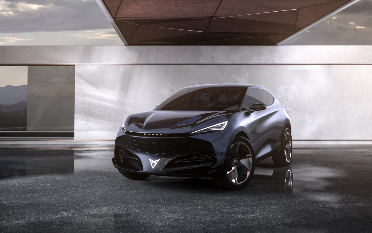 Черный автомобиль Cupra Tavascan Concept в здании 