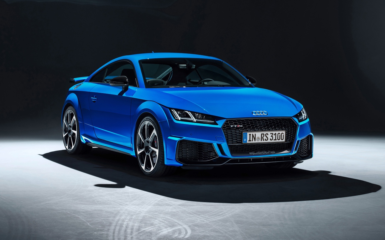 Blue 2018 Audi TT RS car on a gray background