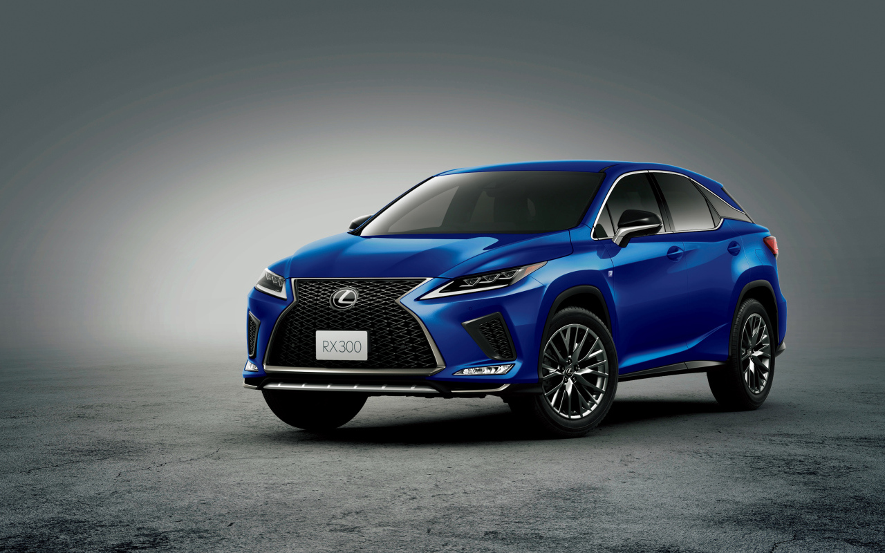 Синий автомобиль Lexus RX 300 F SPORT 2019 года на сером фоне