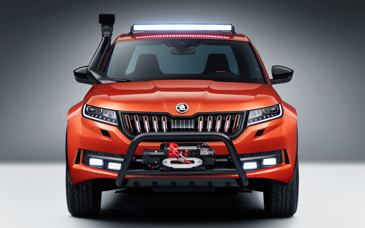 Red 2019 SUV Skoda Mountiaq Concept on a gray background